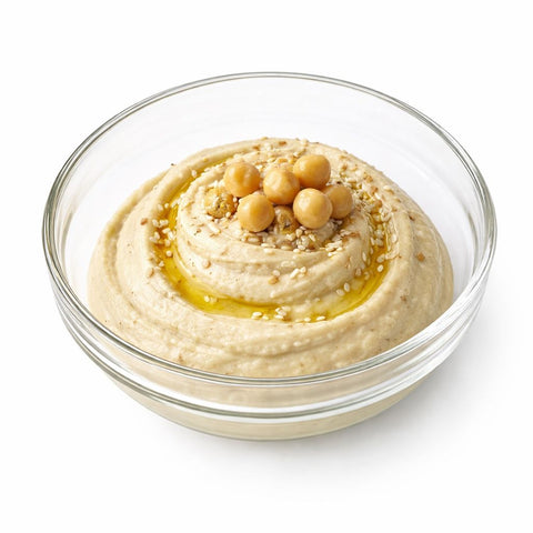 dettaglio finitura di ceci e sesamo su hummus di ceci